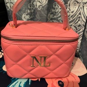Nichole Lynel toiletry handbag